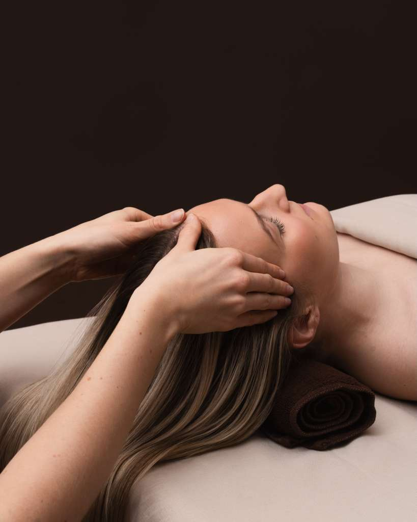 Relaxing scalp massage during a Scalp Spa treatment at Williamsburg Blow Bar